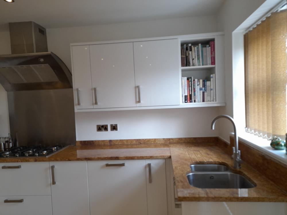 Modern Howden White Kitchen with Appliances & Granite Worktops. Bristol.